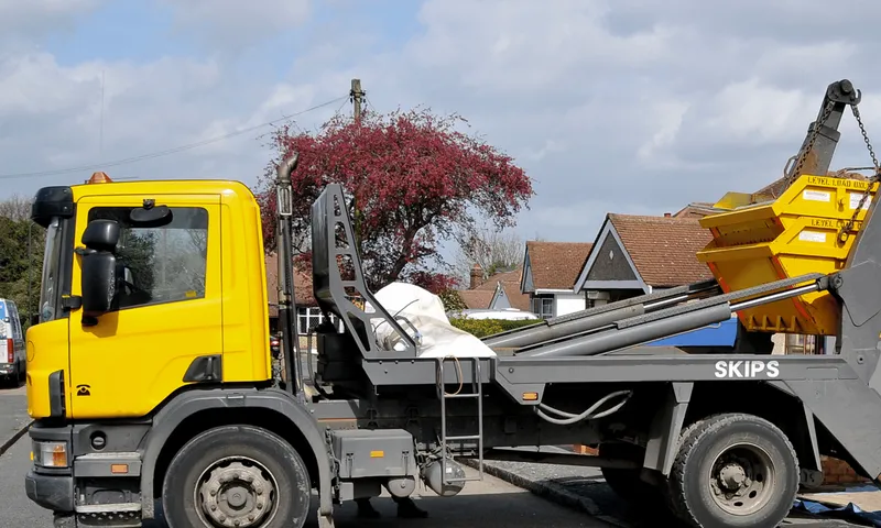 Can a Skip be Lifted over a Wall or Fence?